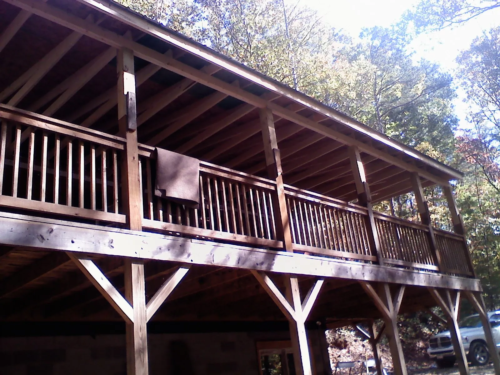 Timber framing under a new elevated porch and deck — Roof Leak Repair in Prairie by Roofing Brothers